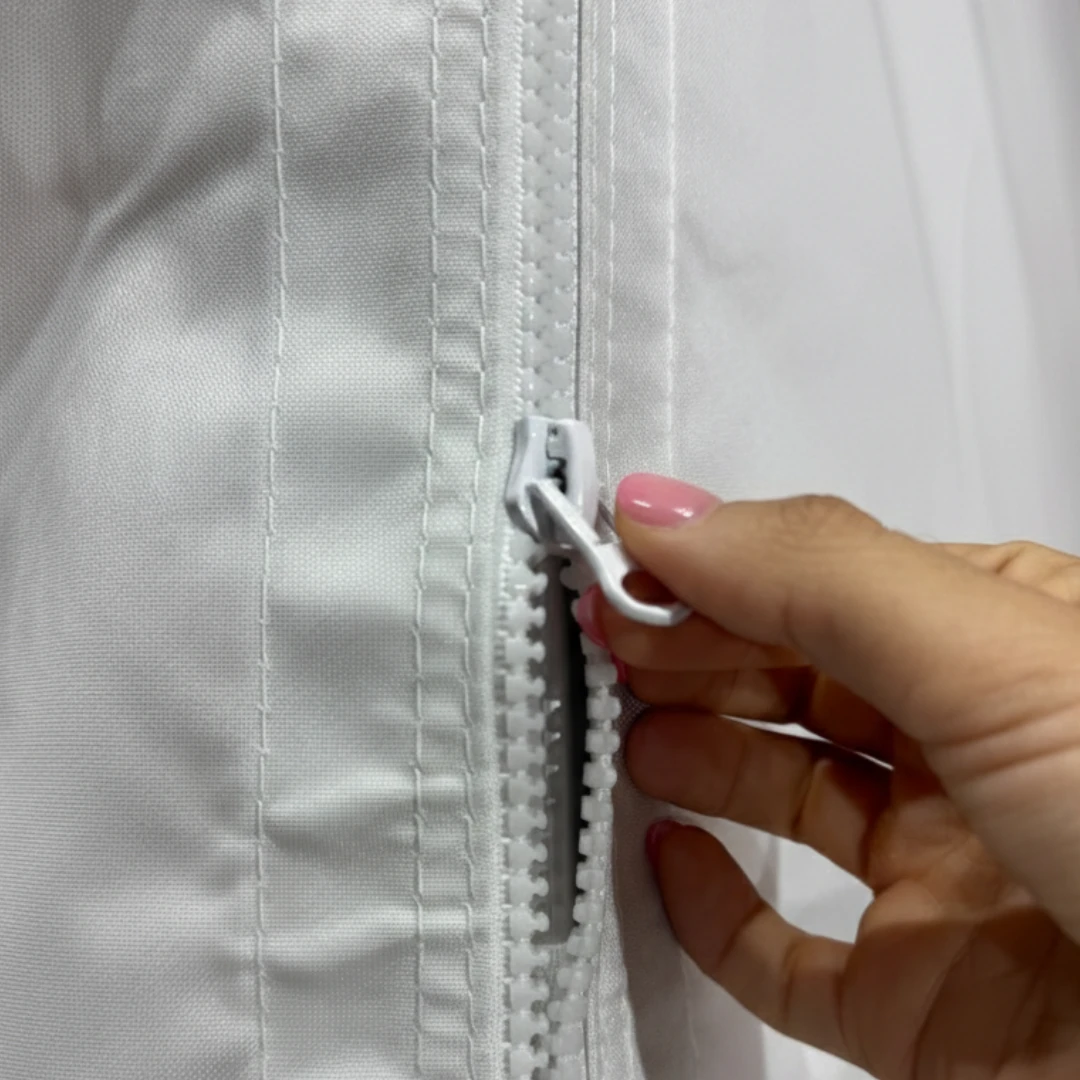 Cierre vertical de esquina con cremallera entre paredes